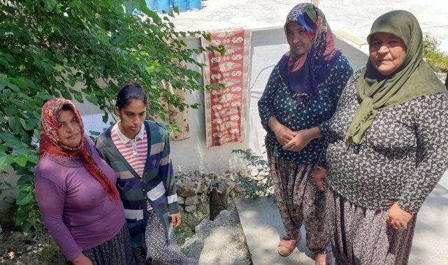 Osmaniye'nin Düziçi ilçesinde yaklaşık 2 yıl önce evlerine çıkan yolun ...