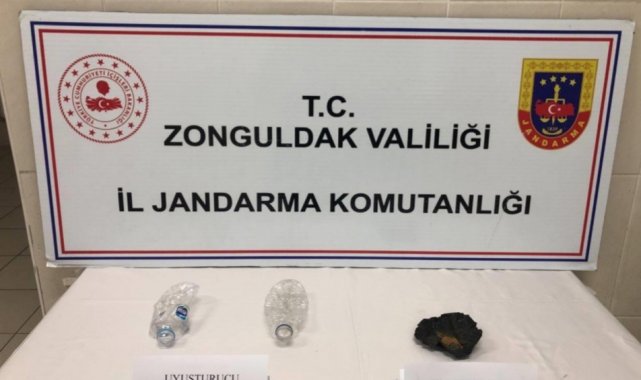 Zonguldak'ta jandarma ekiplerince arama yapılan şüphelinin üzerinden uy...