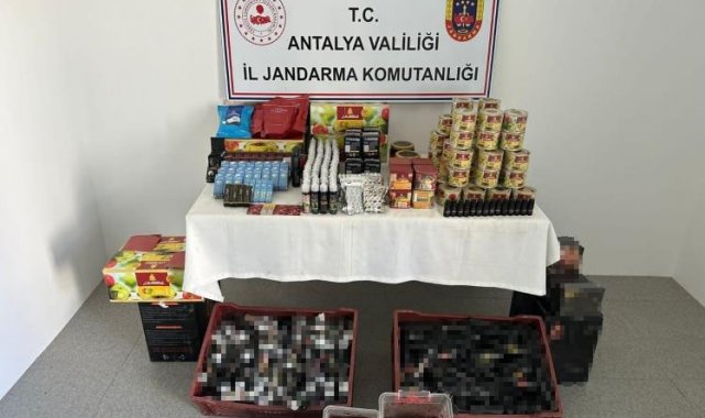 Antalya'da jandarmanın gerçekleştirdiği operasyonda kaçak alkol ve siga...