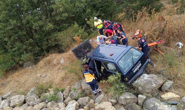 Çorum'un Alaca ilçesinde kontrolden çıkan otomobilin şarampole uçması s...