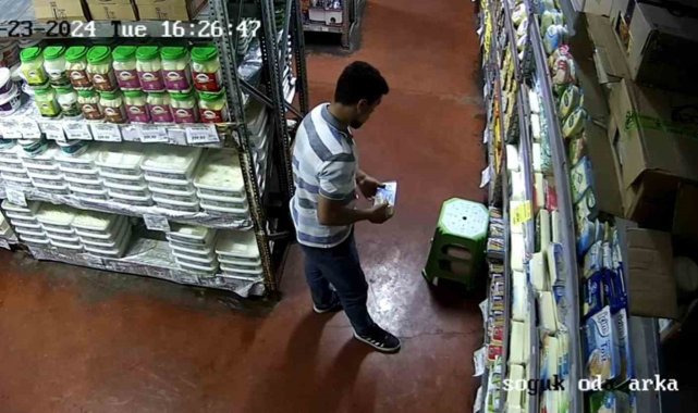 Şanlıurfa'da girdiği marketten 2 adet 2 kiloluk kaşar peynirini pantolo...