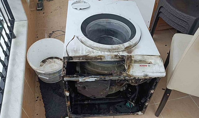 Çamaşır makinesi alev aldı, kadın dumandan etkilendi
