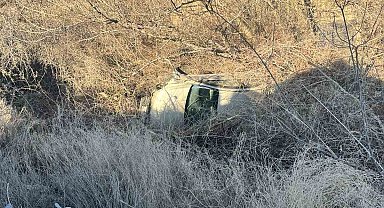 Takla atan otomobilden yara almadan kurtuldu