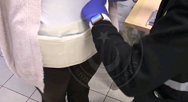 Beline sardığı cep telefonlarıyla Kapıkule'de yakalandı