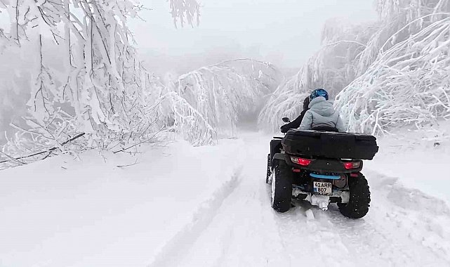Beyaz örtünün keyfini ATV'lerle çıkardılar
