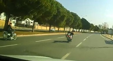 Hem ehliyetsiz hem de motosikleti yatarak sürünce ceza yağdı