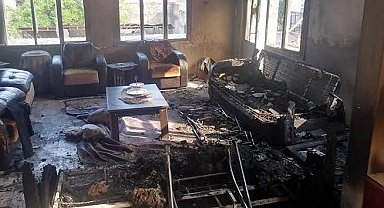 Isparta'da ev yangını, alevler arasında kalan 5 kişi balkondan tahliye edildi