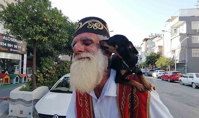 Yıllardır omuzundan indirmediği köpeğini indirdiğine pişman oldu