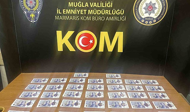 Marmaris'te İngiliz turist sahte poundla yakalandı