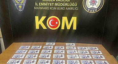 Marmaris'te İngiliz turist sahte poundla yakalandı