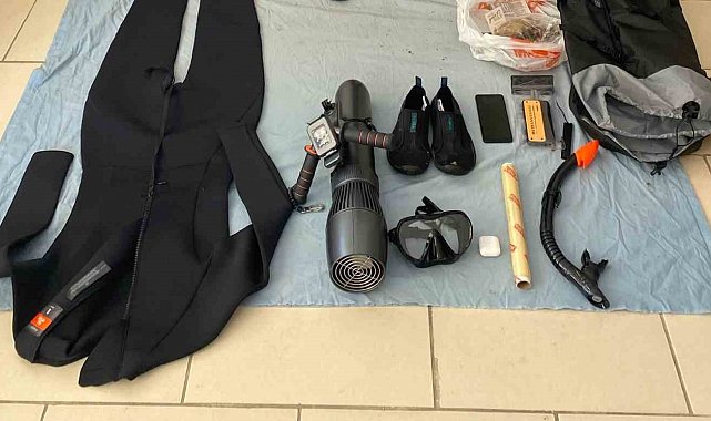 Sisam Adası'na denizden sualtı scooter ile geçmeye çalışırken yakalandı