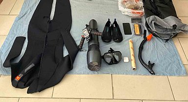 Sisam Adası'na denizden sualtı scooter ile geçmeye çalışırken yakalandı