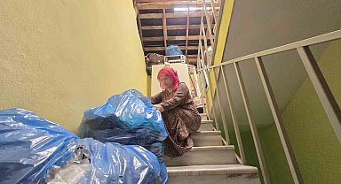 6 yıllık boşanma davasının ardından evden tahliye edilen kadın çatıya sığındı