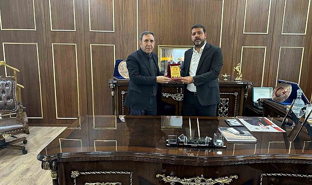 Aile ve Sosyal Politikalar İl Müdürü Polat'tan iş adamı Bozkuş'a teşekkür plaketi