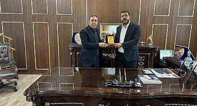 Aile ve Sosyal Politikalar İl Müdürü Polat'tan iş adamı Bozkuş'a teşekkür plaketi