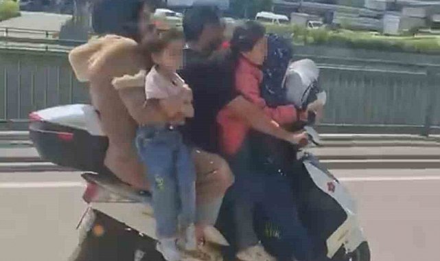 Bursa'da motosiklete 5 kişi binen aile yürekleri ağza getirdi