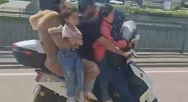 Bursa'da motosiklete 5 kişi binen aile yürekleri ağza getirdi