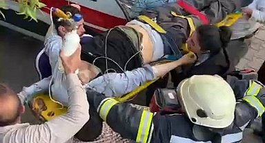 Çatıda fenalaşan adamın imdadına itfaiye koştu