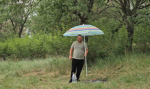 Hasköy'de yarım asırlık gelenek: Mangalları şemsiye ile korudular