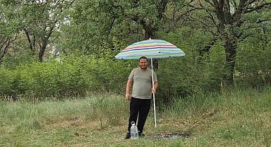 Hasköy'de yarım asırlık gelenek: Mangalları şemsiye ile korudular