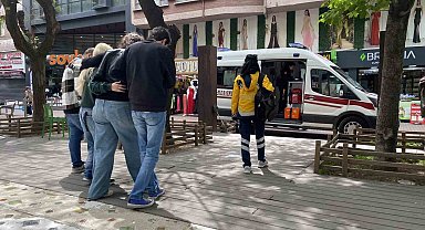 Mağazada yere düşen kadın yaralandı