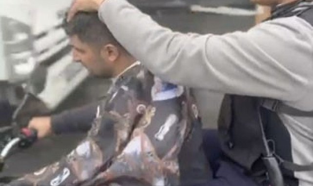 Sultangazi'de seyir halindeki motosiklet üzerinde tıraş