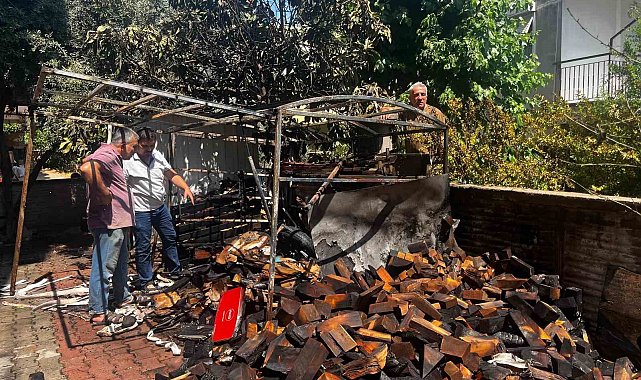 Apartman arkasındaki odunlukta çıkan yangın, mahalleliyi sokağa döktü