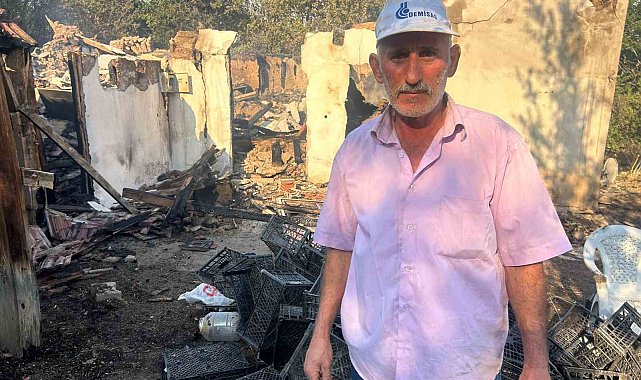 Evini yanmaktan su hortumu ile kurtardı