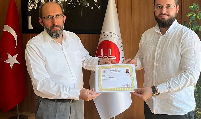 Hisarcık Kaymakamı Bahar'dan İlçe Müftüsü Akyol ve personele başarı belgesi