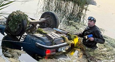 İçerisinde 3 kişinin bulunduğu otomobil suya düştü