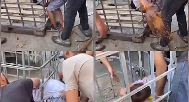 Kafesin parmaklıklarına sıkışan çocuk, demir kesilerek kurtarıldı