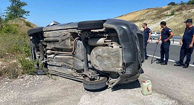 Takla atan otomobilden yara almadan kurtuldular