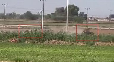 Trafik polisi tarlada traktör kovaladı