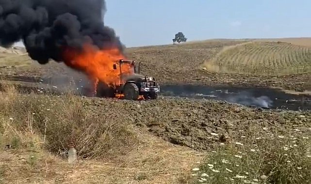 Yanan traktöre aldırmadı, çocuklarını teselli etti
