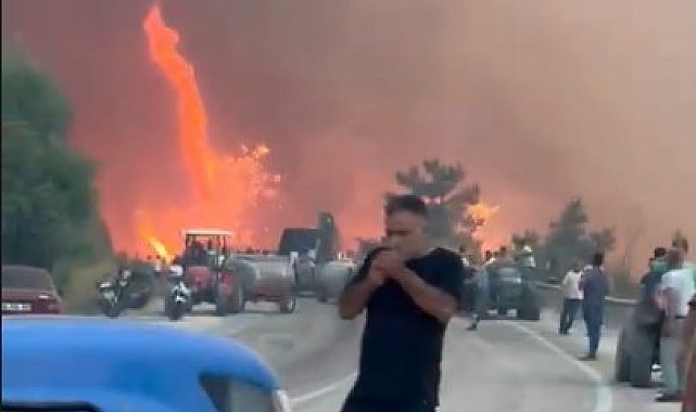 Alevler göğe ulaştı o aldırış etmeden sigarasını yaktı...