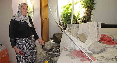 Amasya'da istinat duvarı evin üzerine çöktü