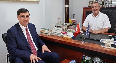 Başkan Eyüp Kahveci'den hacdan dönen muhtarlara ziyaret