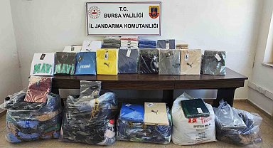 Bursa'da kaçak kıyafet taşıyan sürücü yakalandı