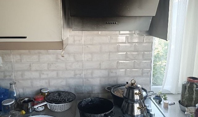 Manyas'ta apartman dairesinin mutfağında yangın çıktı