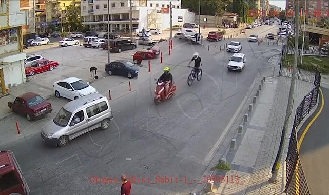 Motosiklete bağladığı iple ana yolda bisikleti çeken sürücü cezasız kalmadı