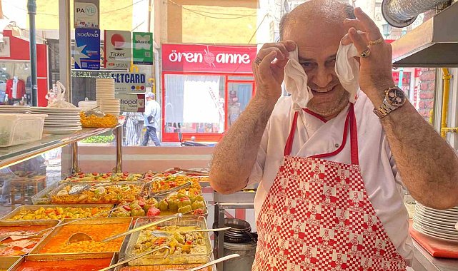 Sıcaktan bunalan aşçı çareyi havluda buldu