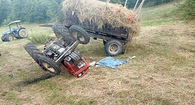 Tarlada devrilen traktörün altında kalan sürücü ağır yaralandı