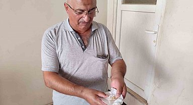 Aldığı ekmekten vida çıktığını iddia etti