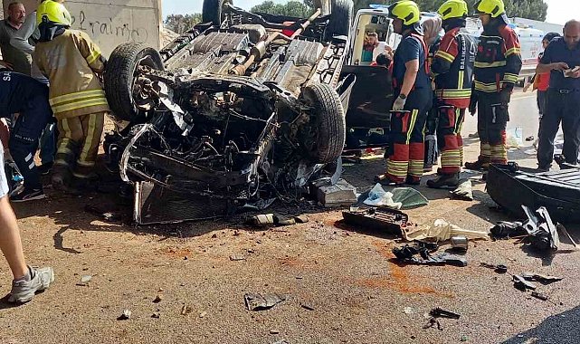 Takla atan otomobilde sıkışan 2 kişiyi itfaiye kurtardı