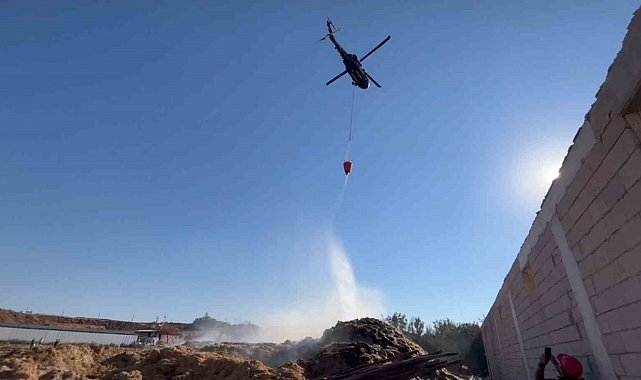 Yanan saman balyalarına jandarma helikopteriyle müdahale