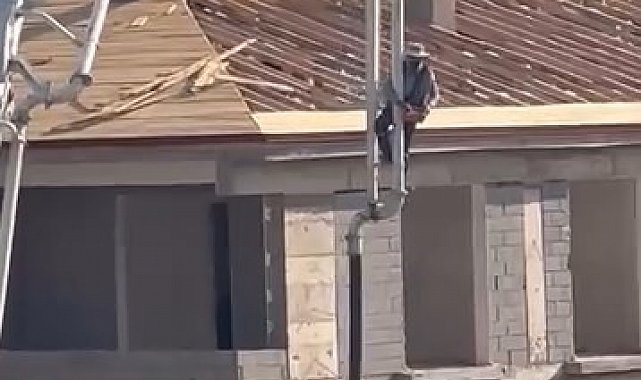 Beton pompasını asansör gibi kullandı, metrelerce yüksekliğe çıktı