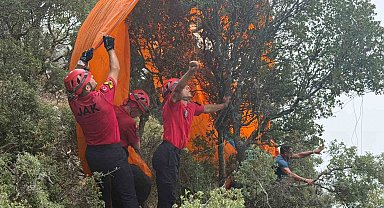 Fethiye'de ormanlık alana düşen paraşütçüleri JAK ekipleri kurtardı