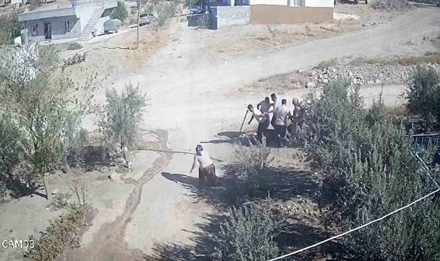 Kafası taşla ezilmek istenen baygın kocasını saldırganlara taş atarak kurtardı