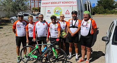 Patnos'a gelen Türk ve ABD'li bisikletliler'den eğitime destek