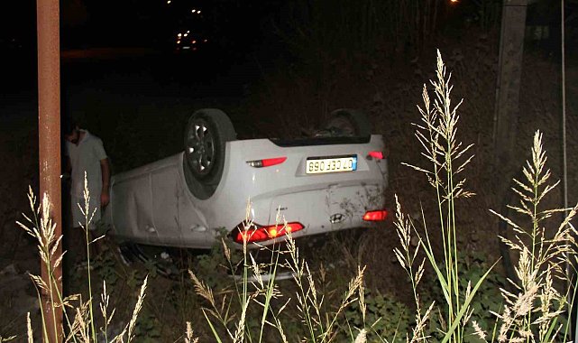 Takla atan araçtan burnu kanamadan çıktılar